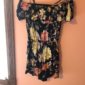 Floral off the shoulder romper with lace edging